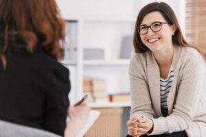 a person and a therapist engage in motivational interviewing