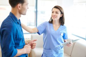 a nurse talks to a person about partial hospitalization for addiction