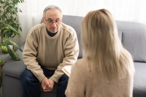 A person participates in addiction treatment.